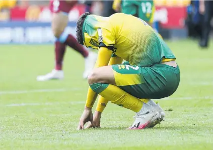  ?? Photo / AP ?? A dejected Max Aarons of Norwich City after the big loss to West Ham.