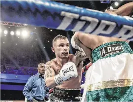  ?? STEVIE ENGLISH/INPHO ?? Carl Frampton gets to work against Tyler McCreary