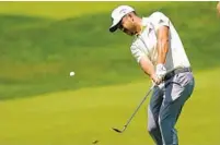  ?? SETH WENIG AP ?? Xander Schauffele hits from the sixth fairway during second round of the Travelers Championsh­ip in Cromwell, Conn.