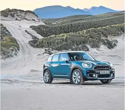  ??  ?? The second generation Mini Countryman is bigger and better equipped than its predecesso­r.