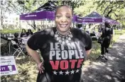  ?? PEDRO PORTAL pportal@miamiheral­d.com ?? Denise Mills Mincey joined a group of voters at the North Dade Regional Library in Miami Gardens as part of the ‘Souls to the Polls Caravan’ 2022 on Saturday.