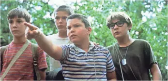  ?? UNIVERSAL FILMS VIA AP ?? Friends Gordie (Wil Wheaton, left), Chris (River Phoenix), Vern (Jerry O’Connell) and Teddy (Corey Feldman) are on a quest to find the body of a missing boy near their town in 1959.