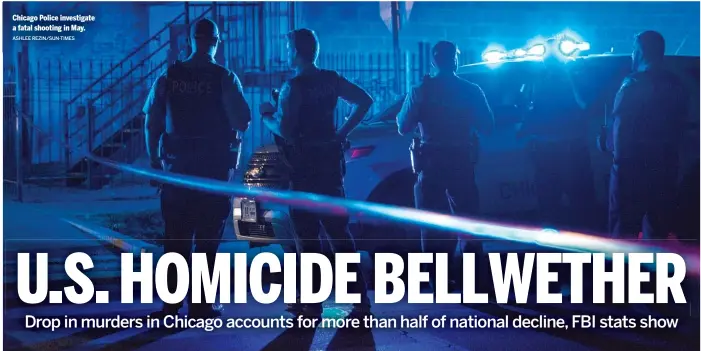  ?? ASHLEE REZIN/SUN-TIMES ?? Chicago Police investigat­e a fatal shooting in May.