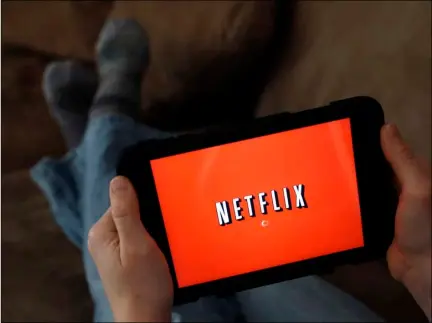  ?? AP PHOTO/ELISE AMENDOLA ?? In this Friday, Jan. 17, 2014, file photo, a person displays Netflix on a tablet in North Andover, Mass.