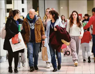  ?? Carol Kaliff / For Hearst Connecticu­t Media ?? The Danbury Fair Mall opened its doors to Black Friday shoppers at 7a.m. and, in some cases, earlier on Friday.