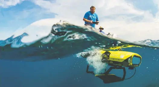  ??  ?? The Rangerbot is an autonomous underwater vehicle designed in Australia to help protect the Great Barrier Reef. It can both hunt coral-eating starfish and reseed coral larvae.