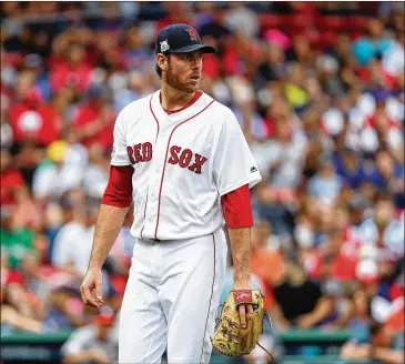  ?? MADDIE MEYER / GETTY IMAGES ?? Doug Fister, signed in November after a year with the Red Sox, has allowed only one walk in 9 ⅓ innings. He’s entering his 10th major league season. The Rangers are his sixth team.