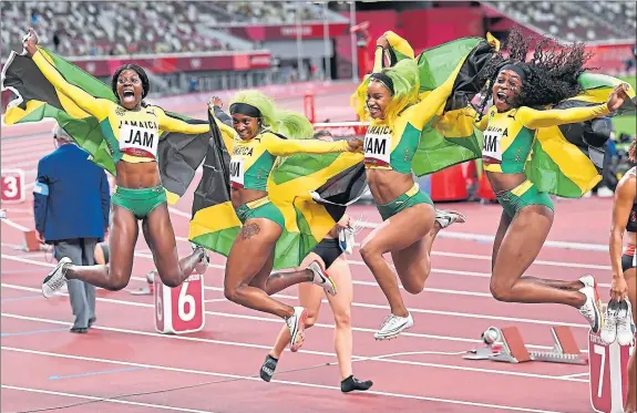  ?? Picture Wally Skalij ?? Jamaica’s women’s 4x100m team, from left, Shericka Jackson, Shelly-ann Fraser-pryce, Briana Williams and 100m and 200m winner Elaine Thompson-herah, jump for joy after winning the gold medal on the penultimat­e day of the Tokyo Olympics