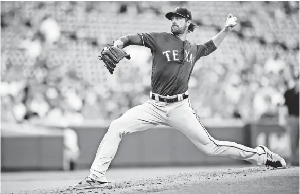  ?? PATRICK MCDERMOTT, USA TODAY SPORTS ?? Since returning from an injury in late June, pitcher Cole Hamels has been mostly brilliant for the Rangers, who are surging in hopes of a wild-card playoff berth.
