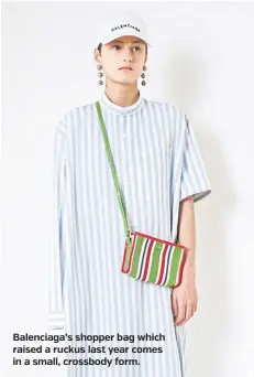  ??  ?? Balenciaga’s shopper bag which raised a ruckus last year comes in a small, crossbody form.