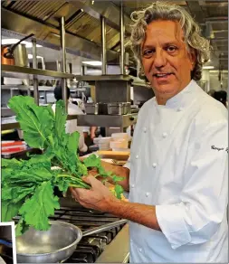  ??  ?? GROWING POPULARITY: Giorgio Locatelli prepares turnip tops at his restaurant. Left: His classic dish, orecchiett­e con cime di rapa