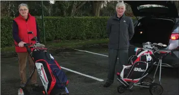  ??  ?? Tomás Keegan and Tom Lynch ready for one last round of golf in Courtown prior to lockdown.