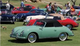  ??  ?? Clockwise from top left: You’ve got to love the simplicity of a 1953–54 Cabriolet, fitted with ‘turbo’ wheel trims; John Laur is a Porsche show regular, having purchased his ’56 convertibl­e 46 years ago; Yes, we were fooled by the patina… This is a convincing 550 Spyder replica!; The one-day meet gathered no fewer than three early ‘soft window’ Targas; Dave Eck’s 911 sunroof coupé looks excellent with its fresh ‘Rennsport’ lettering; The crowd enjoyed a handful of rarities, such as this pair of 1953 356 Pre-as