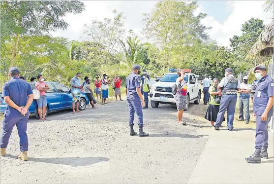  ?? Picture: REINAL CHAND ?? Police arrive in numbers to disperse Danam (Fiji) Ltd employees gathered outside the garment factory in Lautoka yesterday.