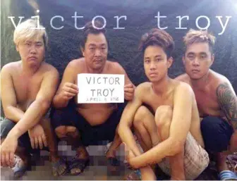  ??  ?? Abu Sayyaf jihadists released a photo dated April 8 of 4 Malaysian hostages Wong Teck Kang, 31, Wong Hung Sing, 34, Wong Teck Chii, 29, and Johnny Lau Jung Hien, 21, who were kidnapped April 2 in Semporna, Sabah. The photo was uploaded on Facebook.