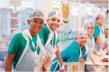  ??  ?? More than 120 children from LOYAC participat­ed in a course for four days at the Cooking Academy of SAVECO that was presented by a group of internatio­nal chefs. The young children enjoyed a fruitful time in developing their skills towards healthy...