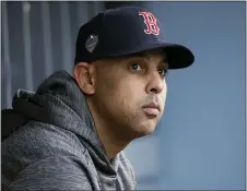  ?? DAVID J. PHILLIP — THE ASSOCIATED PRESS FILE ?? Red Sox manager Alex Cora waits for the start of Game 5of the 2018World Series between the Red Sox and Dodgers in Los Angeles.