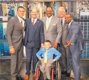  ?? COURTESY OF AUSTIN DENTON ?? La Cueva student Austin Denton, front, was a recent guest on the CBS NFL Today show. He even got to have his photo taken with cast members.
