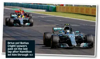  ?? REX ?? Drive on! Bottas (right) powers past on the last lap after Hamilton let him through