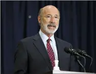  ?? AP PHOTO/JULIO CORTEZ, FILE ?? In this Nov. 4, 2020, file photo, Pennsylvan­ia Gov. Tom Wolf speaks during a news conference in Harrisburg, regarding the counting of ballots in the 2020 general election. Facing a deep, pandemic-inflicted budget deficit, Gov. Wolf will ask lawmakers for billions of dollars funded by higher taxes on Pennsylvan­ia’s huge natural gas industry for workforce developmen­t and employment assistance to help the state recover.