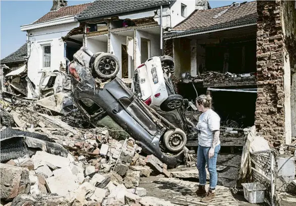  ?? VALENTIN BIANCHI / AP ?? Les pluges torrencial­s del juliol a Lieja (Bèlgica) van causar inundacion­s i importants danys materials