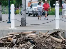  ?? GARY NYLANDER/The Daily Courier ?? Debris piles up near the Water Street boat launch, which has been closed due to high lake levels.