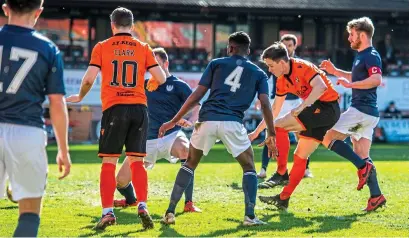  ??  ?? ALL SQUARE: Lawrence Shankland fires in a crucial equaliser against Partick Thistle to spark United’s comeback