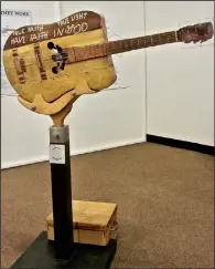  ?? Special to the Democrat-Gazette/MARCIA SCHNEDLER ?? Ed Stilley’s handmade guitars are on exhibit this year at Shiloh Museum of Ozark History in Springdale.