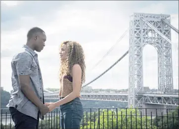  ?? WARNER BROS. ?? Corey Hawkins, left, and Leslie Grace appear in a scene from “In the Heights,” which has prompted debate over whether it needed to feature actors with darker skin.