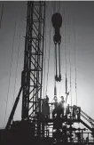  ?? Jon Shapley / Staff photograph­er ?? A drilling rig operates this month in Reeves County.