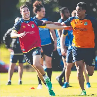  ??  ?? Mitchell Moses (left) trains with Parramatta for the first time yesterday. Picture: PHIL HILLYARD