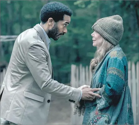  ?? Photograph­s by Patrick Harbron Hulu ?? AN ATTORNEY (André Holland) is lured back to his hometown, reuniting him with his estranged adoptive mother (Sissy Spacek).