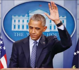  ?? The Associated Press ?? U.S. President Barack Obama waves at the conclusion of his final presidenti­al news conference on Wednesday.