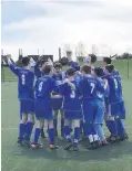  ??  ?? Champion-ees AC Rovers celebrate winning silverware