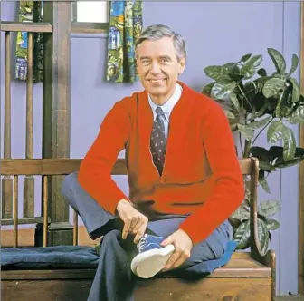  ?? Courtesy of The Fred Rogers Co. ?? Fred Rogers hosting “Mister Rogers’ Neighborho­od.” PBS plans to air a retrospect­ive — titled “Mister Rogers: It’s You I Like” — in March in honor of the program’s 50th anniversar­y.