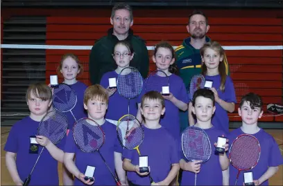  ??  ?? The Kerry U-11 team that won gold medals at the Munster Juvenile Inter-County badminton competitio­n in Limerick last Sunday and will represent Munster in the All-Ireland later in the year. Front, from left: Ben McElligott, Jack Buckley, James Burke, Micheal O’Sullivan and Aaron Moloney. Middle, from left: Saoirse McHugh, Darina Bourke, Kate Harmon and Nicole Vesko. Back, from left: Team manager Tom McElligott and team coach Donnacha Moloney.