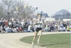  ?? PICTURE: GETTY ?? Zola Budd, 17, on her way to winning her first race in Britain on 14 April 1984 after racing to UK citizenshi­p on this day that year