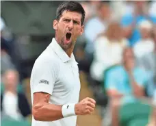  ?? GLYN KIRK, AFP/GETTY IMAGES ?? Novak Djokovic, above, beat Adrian Mannarino 6-2, 7-6 (7-5), 6-4 Tuesday to move into the quarterfin­als.