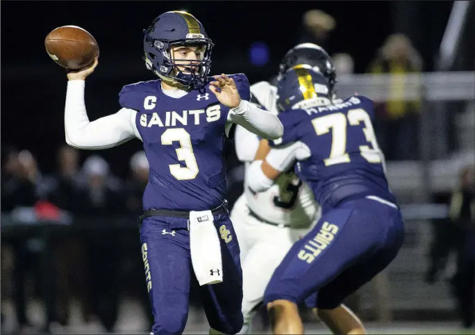  ?? File photo/Special to NWA Democrat-Gazette/DAVID BEACH ?? Shiloh Christian quarterbac­k Eli Reece (3) looks for an open receiver against Pea Ridge on Nov. 8 at Champions Stadium in Springdale. Reece led the Saints to a perfect 10-0 season and the 4A-1 Conference championsh­ip.