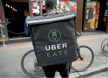  ?? PHOTO: REUTERS ?? There are now 190 restaurant­s delivering via Ubereats in Auckland.
