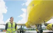  ?? KEVIN SPEAR/ORLANDO SENTINEL ?? Ashley Beccara, 26, a manager of ramp operations for Swissport, said co-workers are returning.