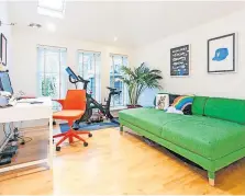  ?? ?? Vibrant The home office doubles as a workout room