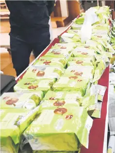  ??  ?? The drugs packed into tea packages. — Bernama photos