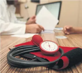  ?? ADAM BERRY TORSTAR FILE PHOTO ?? The College of Family Physicians of Canada says the problem of family-doctor vacancies won’t be fixed until provinces make the profession more attractive to graduates through more competitiv­e pay models.