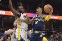  ?? BRANDON DILL — THE ASSOCIATED PRESS ?? Grizzlies guard Ja Morant scored 47points against the Warriors during Game 2 of a second-round playoff series Tuesday.