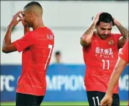  ?? XINHUA ?? Guangzhou Evergrande’s Brazilian players Ricardo Goulart (right) and Alan are set to be axed by the club.