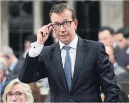  ?? SEAN KILPATRICK THE CANADIAN PRESS ?? Scott Brison, Canada’s first openly gay cabinet minister, said he leaves politics more convinced that “government matters” and says his own life story is proof.