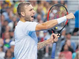  ??  ?? Dan Evans reacts during his match against Bernard Tomic.