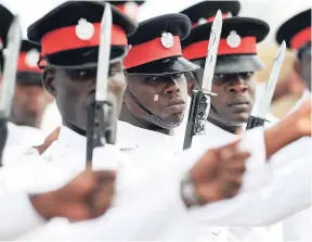  ??  ?? In this file photo, members of the force parade at the installati­on ceremony for the comissione­r of police at the Police Officers’ Club.