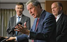  ?? WIN MCNAMEE / GETTY IMAGES ?? Gov. John Kasich (center), Colorado Gov. John Hickenloop­er (left) and Alaska Gov. Bill Walker speak during a press conference Friday in Washington, D.C., about a blueprint for improved health care. Kasich has convened a committee in Ohio to study gun...